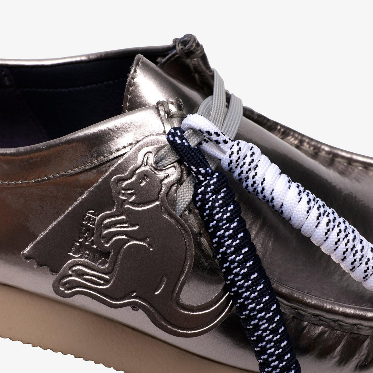 Wallabee 2604 Silver Patent - US 4777